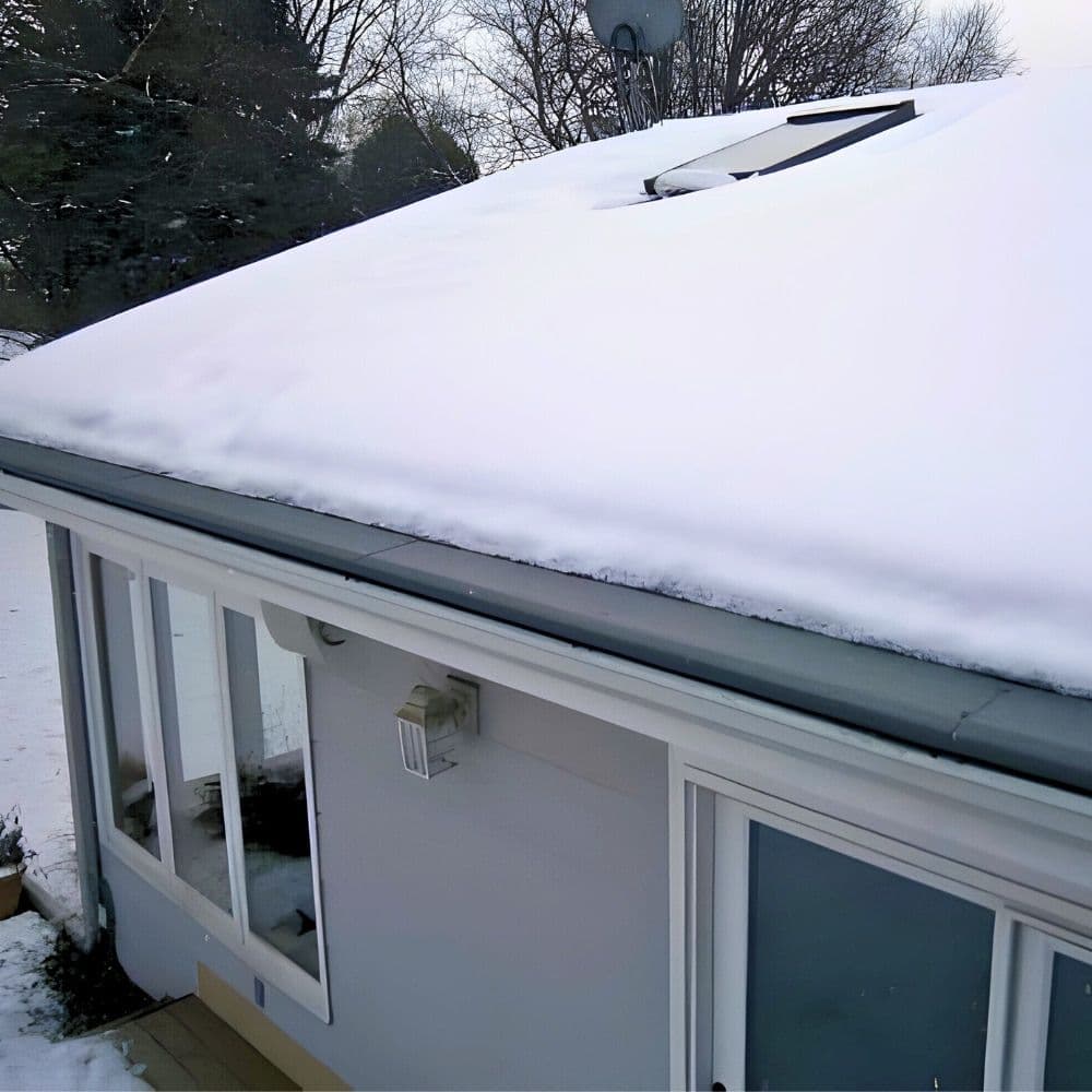 snow-on-roofline-all-climates-gutter-helmet.jpg